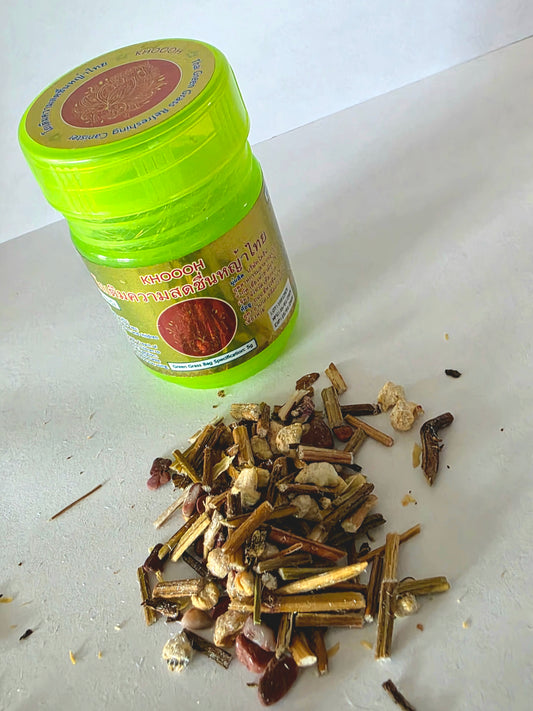 “Thai Ya-Dom herbal inhaler stick – green packaging”

“Natural menthol inhaler from Thailand – product shot”

“Person using Thai Ya-Dom nasal inhaler for congestion”